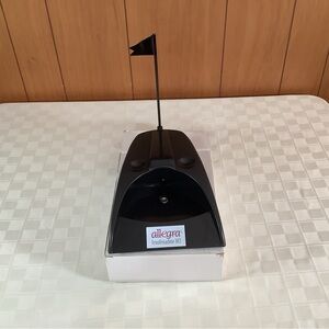 New golf putting cup return